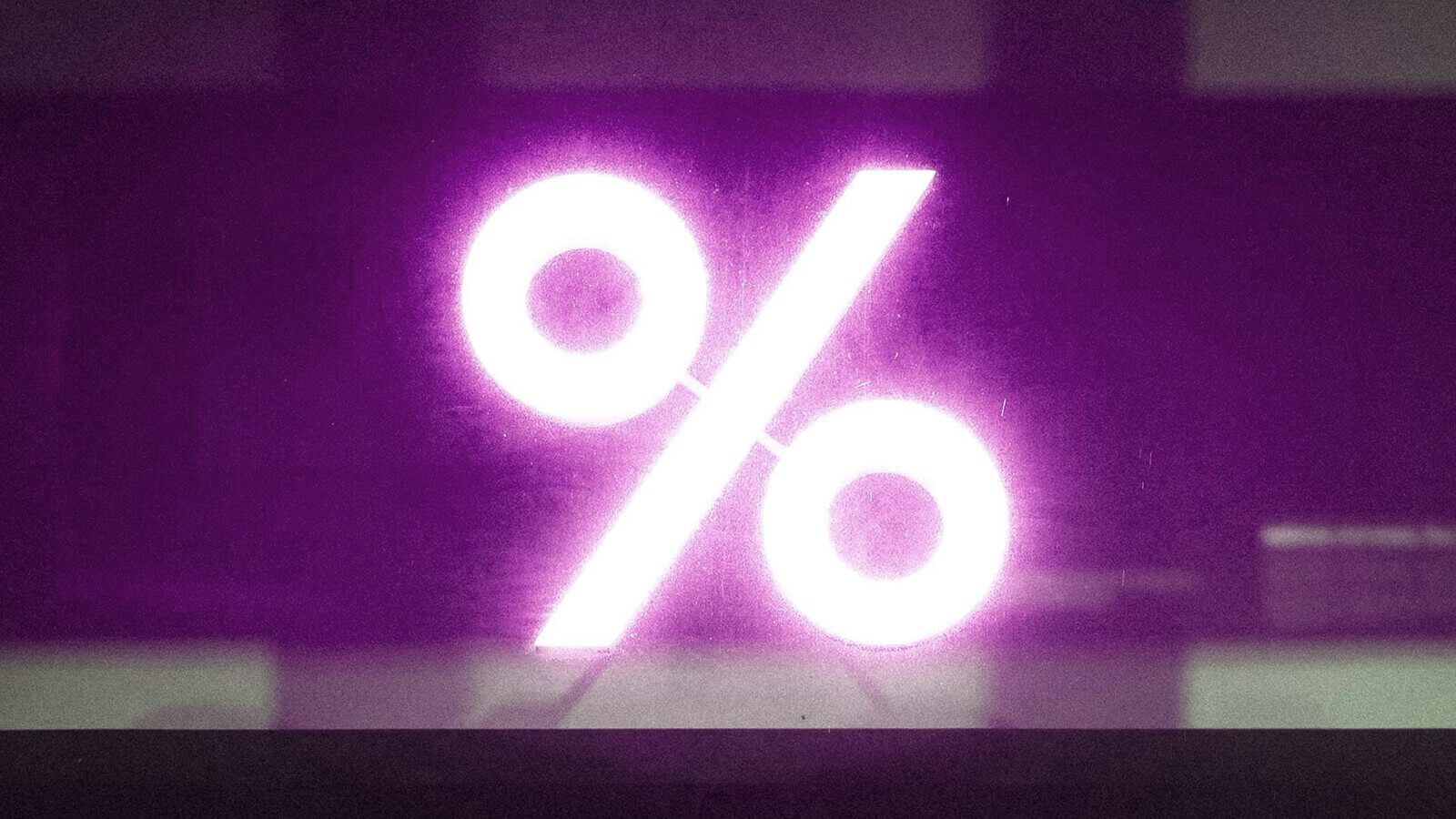 a percent sign against a purple background